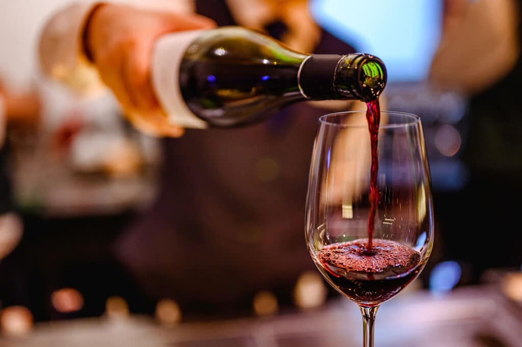 bartender serving wine